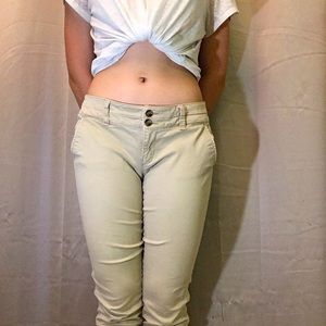 Tan double button American eagle skinny jeans